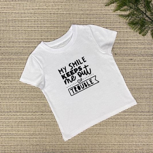 My Smile Keeps Me Out of Trouble Baby & Toddler T-Shirt